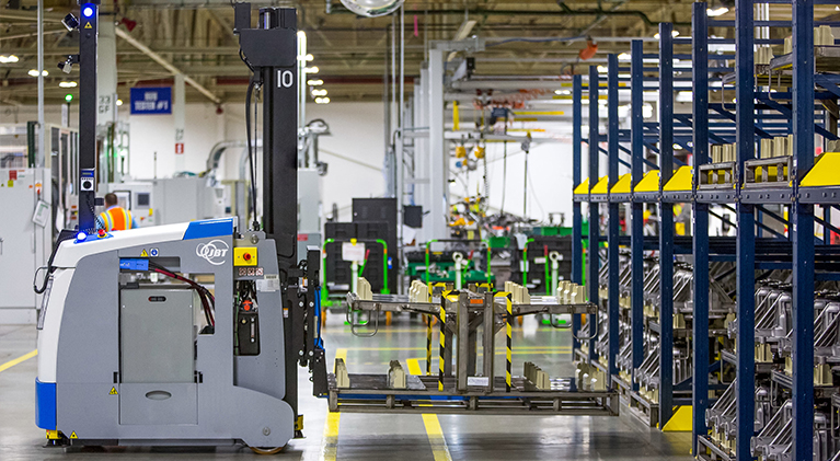 Automated forklift in car manufacturing facility
