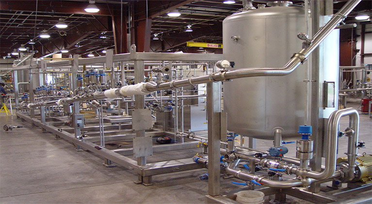 Customized skidded modular process system for pharmaceutical manufacturing line