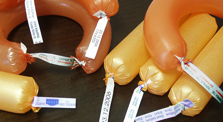 Clipped sausage with labels